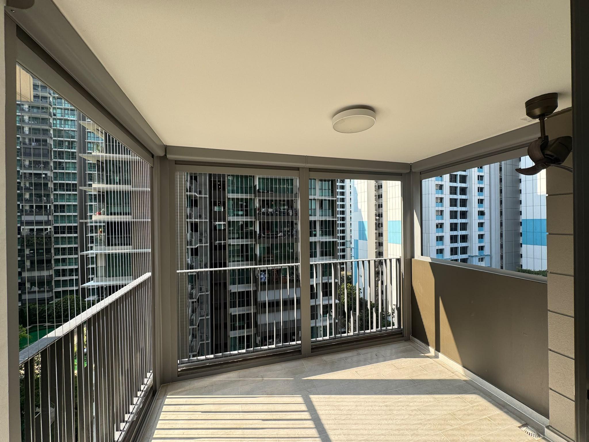 Condo balcony showing Zipblind headboxes, side tracks and panel divisions with the blinds raised