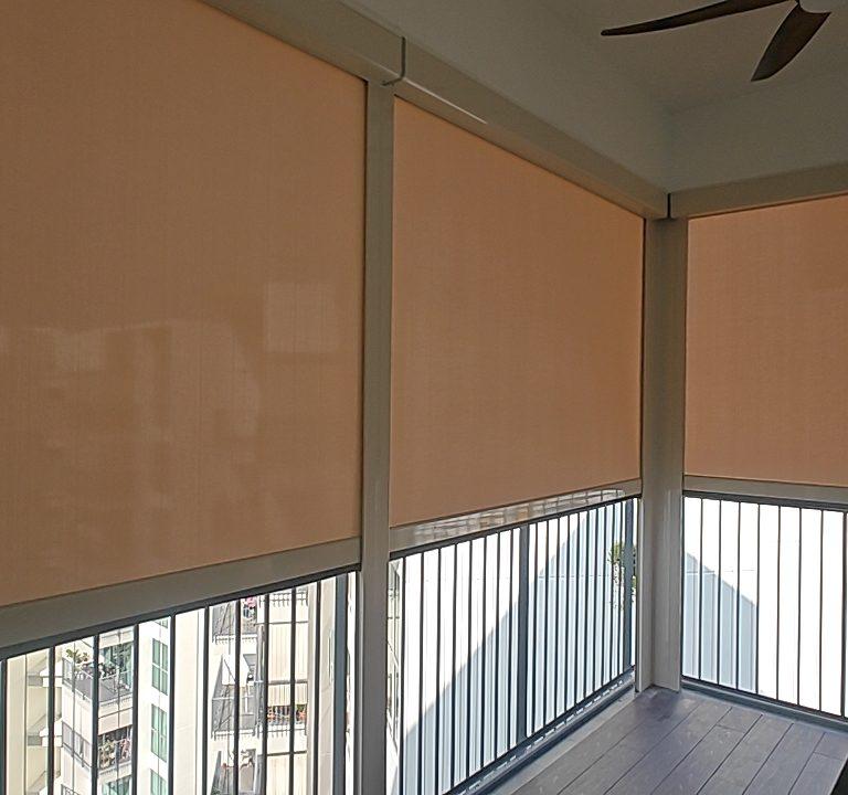 Condo balcony with SmartZip outdoor Zipblind panels installed across a corner opening in Singapore