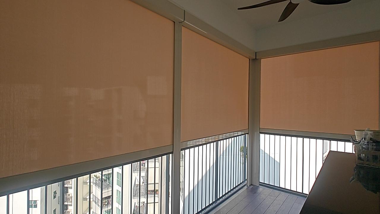 Condo balcony with SmartZip outdoor Zipblind panels installed across a corner opening in Singapore