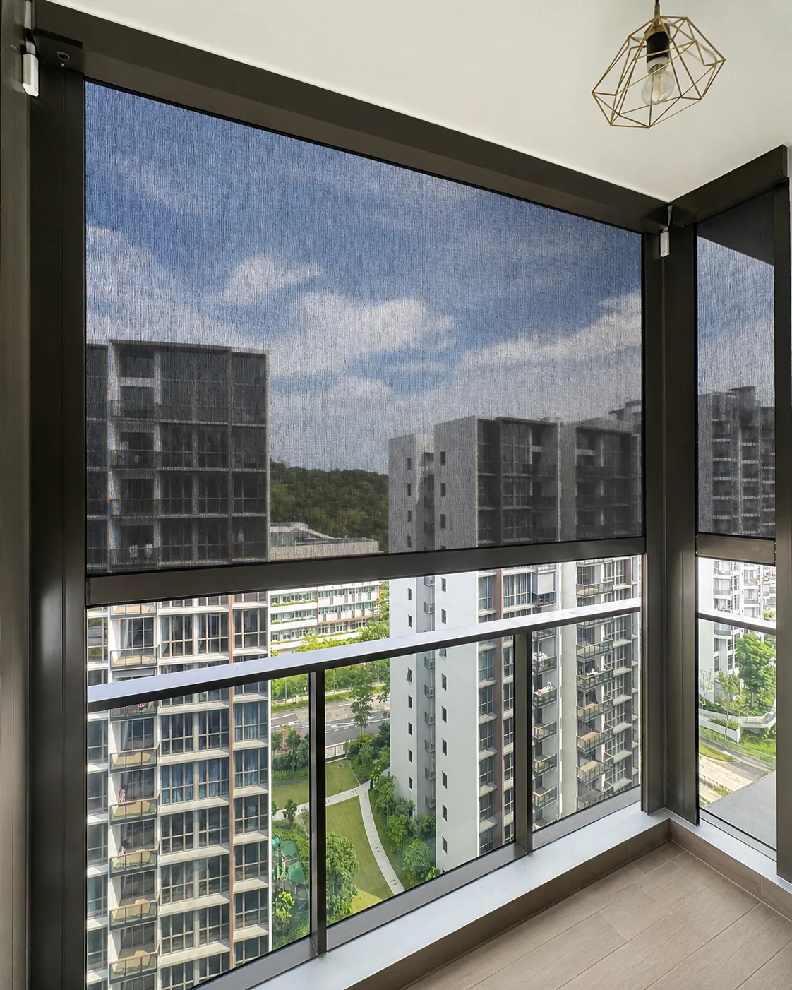 SmartZip outdoor blind installed on a condo balcony